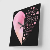 Christelijk vertrouwen van het hart van de vrouw i vierkante klok (Hoek)