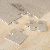 Christelijke engel zittend op een steen legpuzzel (Zijkant)