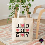 Christian Tic Tac Toe Joy God Hearts Tote Bag<br><div class="desc">Faith meets fun with a little game-day energy. This playful tic-tac-toe inspired design swaps the usual X’s and O’s for watercolor hearts while spelling out JOY and GOD across the grid. Bright, bold, and easy to love, it’s the kind of tote that carries your everyday essentials while sharing a simple...</div>