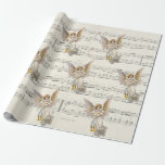 Christmas Angel Music  inpakpapier<br><div class="desc">Sluit iets speciaals af met dit kerstvakantie-ontwerp met  engelen en bladmuziek. Elke engel heeft gouden vleugels en een blauwe en gouden jurk. Haar handen zijn over haar hart gekruist. U kunt meer vinden in de enfrancais winkel - volg gewoon de blauwe link onder "ontworpen door" hierboven.</div>