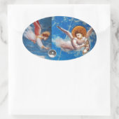 CHRISTMAS ANGELS IN BLUE SKY HOLIDAY OVALE STICKER (Tas)