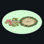 CHRISTMAS BANJO MET MISTLETOES EN HOLLY BERRIES OVALE STICKER<br><div class="desc">Elegant ornamental  muziekinstrument met bloemkroon.</div>