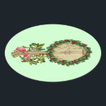 CHRISTMAS BANJO MET MISTLETOES EN HOLLY BERRIES OVALE STICKER<br><div class="desc">Elegant ornamental  muziekinstrument met bloemkroon.</div>