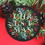 CHRISTMAS Berries Greenery Holiday Black Ronde Sticker<br><div class="desc">Het woord CHRISTMAS wordt op een zwarte achtergrond (of in welke kleur dan ook) op deze ronde stickers,  elegant voor envelopzegels,  feestvieren of kerstfeestdagen aangebracht onder bladeren en bessen. Punten in onze winkel koppelen.</div>