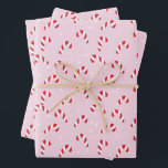 Christmas Candy Cane Pink Inpakpapier Vel<br><div class="desc">Kerst snoep over roze achtergrond</div>