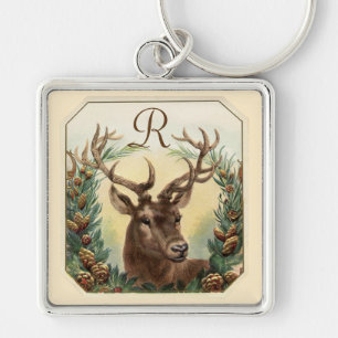 CHRISTMAS DEER MET PIJNCONS CROWN MONOGRAM SLEUTELHANGER