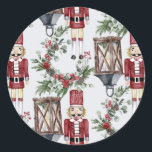 Christmas nutcrackers and lanterns ronde sticker<br><div class="desc">Watercolor painting of traditional Christmas decorations with nutcrackers,  wreaths and lanterns.</div>