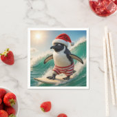 Christmas Penguin Surfing On an Ocean Wave Servet (Insitu)
