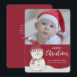Christmas Snowman Custom Photo-Name Feestdagenkaart<br><div class="desc">Kerstsneeuwpop met kerstmuts en rood-wit gestreepte sjaal,  zittend in de sneeuw. Voeg je eigen foto en familienaam toe voor een gepersonaliseerde one-of-a-kind kaart.</div>