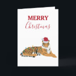 Christmas Tiger Funny Animal met Santa Hat Kaart<br><div class="desc">Een grappige tijger die in de kerstsfeer komt door het dragen van een kerstmuts. Stuur je kerstwensen in een unieke stijl en laat je vrienden en familie giechelen. Ideaal kerstontwerp voor uw kerstdecor en geschenken. Pas de tekst aan en maak het uw eigen.</div>