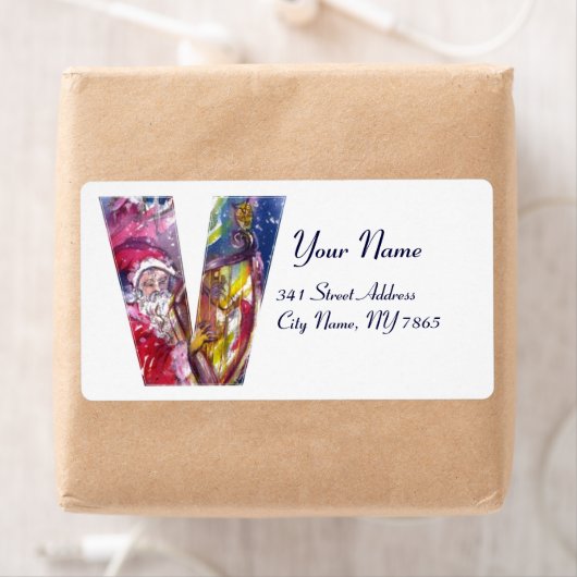 CHRISTMAS V LETTER/SANTA SPEELT HARP UIT ETIKET (Insitu)