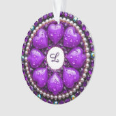 Circulaire paarse sieraden broche met hart ornament (voorkant)