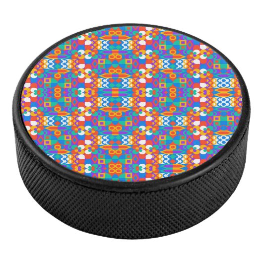 Circular decorative object with a vibrant hockey puck (3/4)