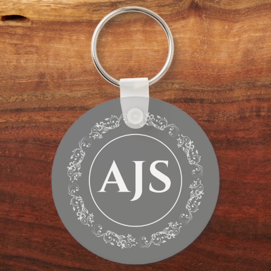 Cirkelvormig ontwerp met Monogramm. Sleutelhanger (Voorkant)