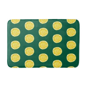 Citroenen op groen badmat