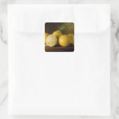 citroenen op hout vierkante sticker (Tas)