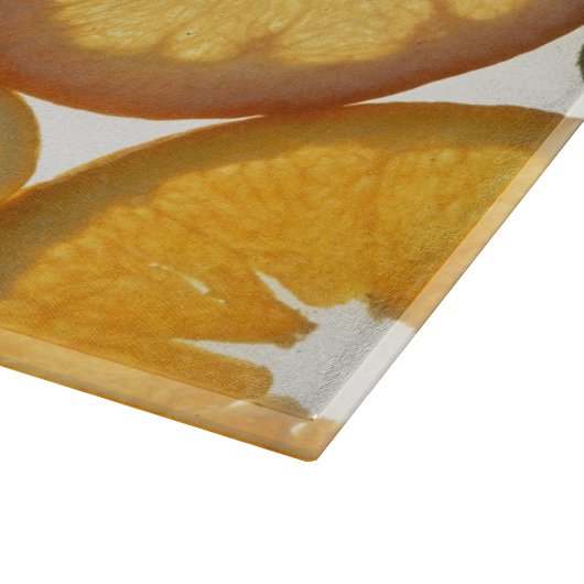 Citrusvruchten plakjes sinaasappel groen geel wit snijplank (Hoek)