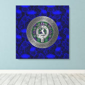 Clan Sutherland Crest & Tartan Knot op Thistle Canvas Afdruk (Insitu (Houten vloer))