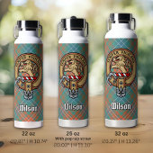 Clan Wilson Crest over Oude Tartan Geïsoleerde Drinkbeker