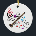 Clarinet met muziek keramisch ornament<br><div class="desc">Clarinet met roerige staf en kleurrijke muzieknoten</div>
