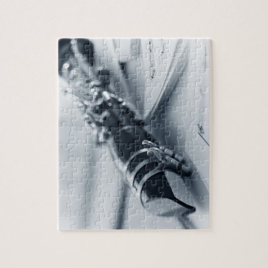 Clarinet on Music Sheets Legpuzzel (Verticaal)