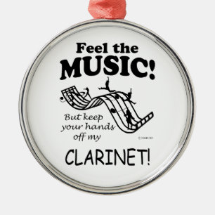 Clarinet voelt de muziek metalen ornament