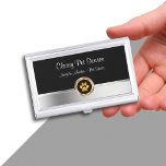 Classy huisdier thema visitekaartje geval visitekaarthouder<br><div class="desc">Pet thema visitekaartje hoesjes in een stijlvol ontwerp met zilver en goudkleurige designelementen,  waaronder een poot print symbool en tekstruimte die u kunt personaliseren om aan uw huisdier thema bedrijf te voldoen. Zie dit als een visitekaartjes hoesjes sjabloon voor een huisdier oppas,  huisdier salon,  of een huisdier industrie professional.</div>