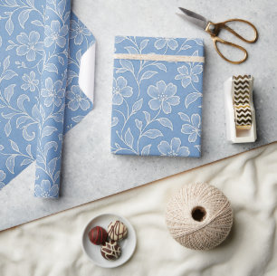 Classy laat bloemenkunstpatroon op lichtblauw cadeaupapier