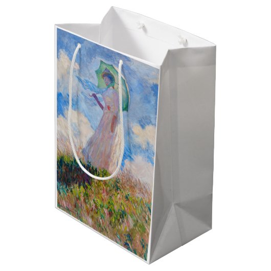 Claude Monet - Vrouw met een parasol naar links Medium Cadeauzakje (Achterkant Gekanteld)