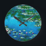 Claude Monet-Water-Lilies Ronde Klok<br><div class="desc">Watergelieerd in 1906,  is een van de beroemdste schilderijen van Claude Monet.Een elegante ronde wandklok met lichtsterkten blauw,  groen en geel voor impressionistische liefhebbers en iedereen die echte mooie kunst waardeert.</div>