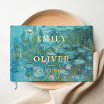 Claude Monet Waterlelies Trouwen Gastenboek<br><div class="desc">Trouwgastenboek met monogram namen en datum in gouden folie met Claude Monet Water Lelies schilderij achtergrond.</div>