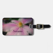 Clematis verdampt kleine zakken dicht bij een pers bagagelabel (Voorkant horizontaal)