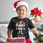 Clingy elf overeenkomende kerstfamilienaam kinder shirts<br><div class="desc">Met dit leuke Clingy elf-T-shirt dat deel uitmaakt van een bijpassend collectie voor huiseigenaars met cadeaus voor elk familielid, ga je de feestdagen in. Dit t-shirt is perfect voor elke kerstgezinshereniging of als een familie die overeenkomt met de pajama, is voorzien van een schattig pet en poten, met de titel...</div>