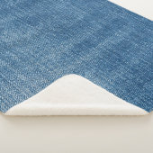 Close-up blauwe denim jeans textuur sherpa deken (3/4)