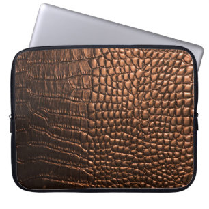 Close-up: krokodillenleer textuur. laptop sleeve