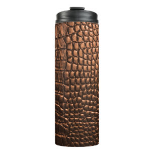 Close-up: krokodillenleer textuur. thermosbeker