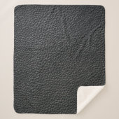 Close up of black leather texture and backgroundle sherpa deken (Voorkant)