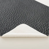 Close up of black leather texture and backgroundle sherpa deken (3/4)