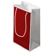 Close-up Rode Textiel Patroon Gift Bag Klein Cadeauzakje (Voorkant Gekanteld)