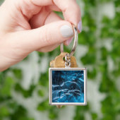 Close-up van blauwe ijsmuren sleutelhanger (Hand)