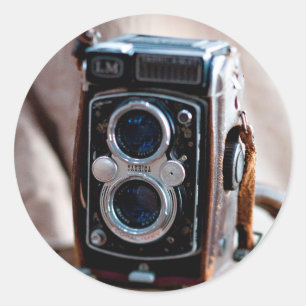 Close-up van een antieke camera ronde sticker