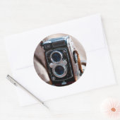 Close-up van een antieke camera ronde sticker (Envelop)