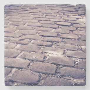 Close-up van een kasseienstraat stenen onderzetter