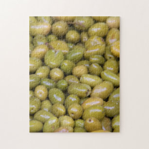 Close-up van groene olijven legpuzzel