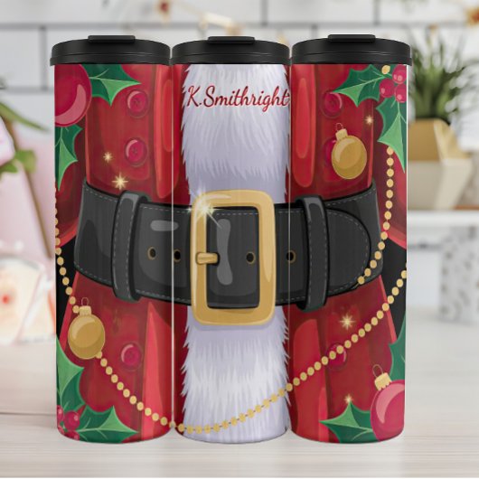 Close-up van het pak van de kerstman thermosbeker