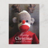 Close-up van sok aap gezicht met gewei, rood feestdagenkaart (Voorkant)