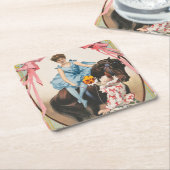 Clown die bloemen overhandigt aan een vrouw te paa kartonnen onderzetters (Schuin)