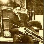Clyde Barrow - de Barrow Gang Staand Fotobeeldje<br><div class="desc">Clyde Barrow heeft met Bonnie Parker samengewerkt in de overvallen van winkels en benzinestations.  Het doel was een inval in de bevrijding van de Eastham-gevangenis te lanceren.  De tekst kan worden aangepast of worden verwijderd.</div>