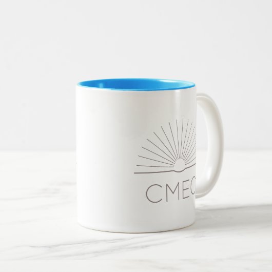 CMEC Tweekleurige Mok - grijs logo, turquoise inte (Voorkant rechts)