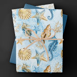 Coastal Chic | Modern Blue and Gold under the Zee Inpakpapier Vel<br><div class="desc">Het flitsende dusferblauw en gouden handbeschilderde nautische waterverf "onder het zee" strandontwerp brengt een moderne draai aan een oud thema. Het collectie bevat seizoenshellen, zeesterren, een zeepaardje en koraalrif in het complimenteren van tintelingen van blauw, goud en gebroken wit met een blauwe vlek voor een watereffect. Voor andere kleuren of...</div>
